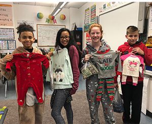 picture of Watevliet Elementary School student ambassadors collecting pajamas in a classroom