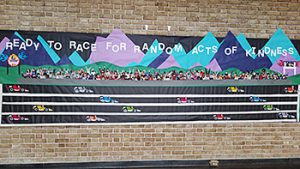 picture of race track themed Kindness Matters bulletin board