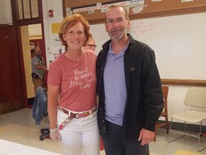 picture of music teacher retiress standing next to each other and smiling