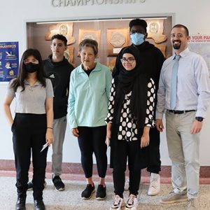 picture of essay winners standing with Elks representative and high school principal