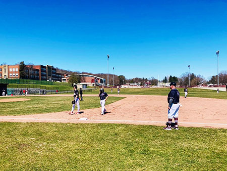 Watervliet baseball players on the field.