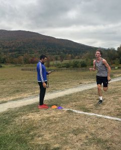 Cross country runner crosses the finish line