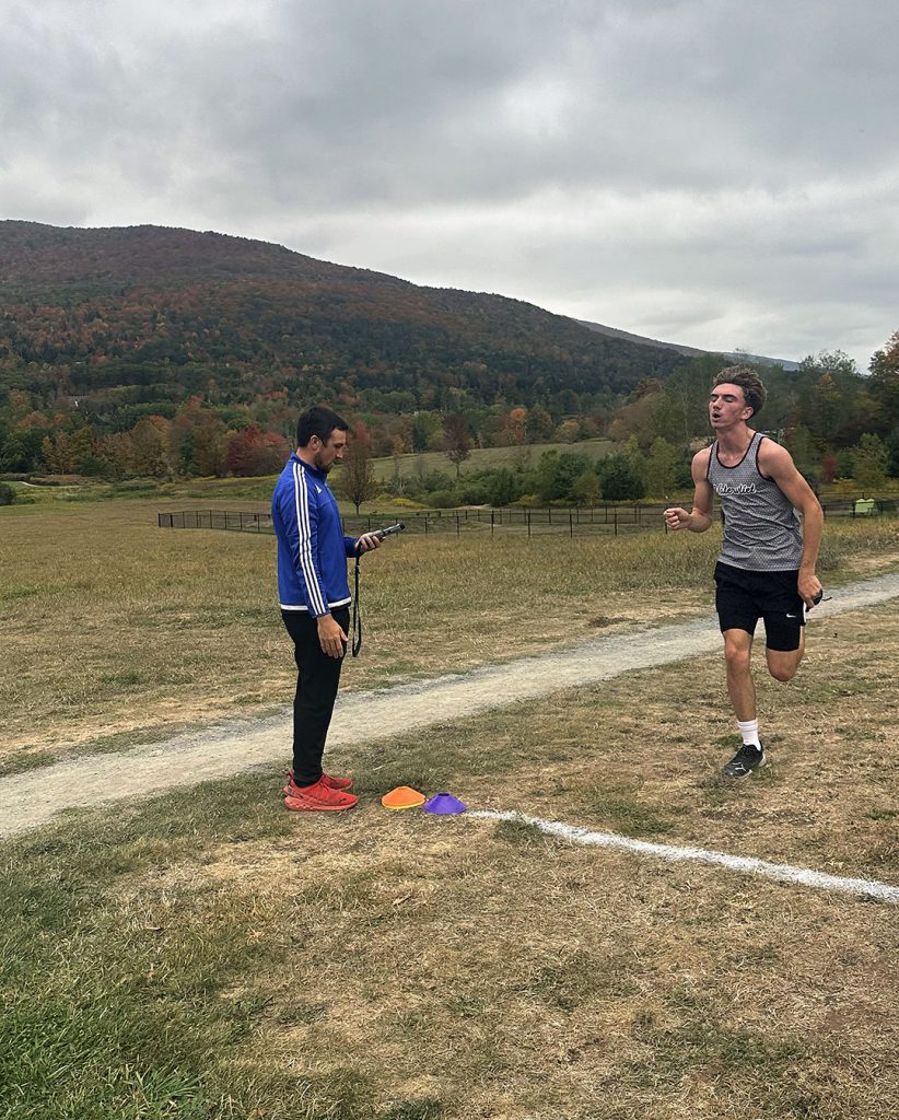 Cross country runner crosses the finish line