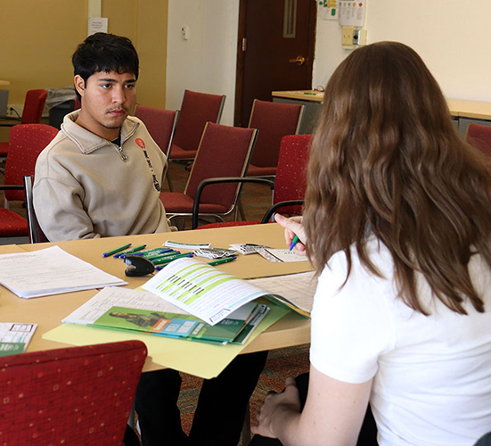 Student meets with an admissions counselor