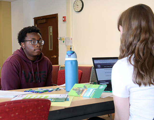 Student meets with an admissions counselor