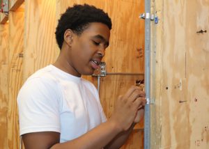 Student explores the electrical trades program at Albany Career & Technical School